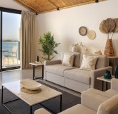 Emiraty-Dubai-Anantara_World_Islands_Dubai_Resort_Guest_Room_Two_Bedroom_Beach_Pool_Villa_Living_Area_and_Balcony